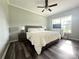 Cozy bedroom featuring natural light, ceiling fan, and light gray walls at 1238 Shinnville Rd, Cleveland, NC 27013