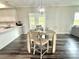 Cozy dining room adjacent to the kitchen with a view of the front yard at 1238 Shinnville Rd, Cleveland, NC 27013