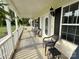Inviting covered front porch with seating and charming details, ideal for relaxing and enjoying the outdoors at 1238 Shinnville Rd, Cleveland, NC 27013