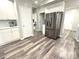 Bright kitchen featuring stainless steel appliances and white cabinets and countertops at 1238 Shinnville Rd, Cleveland, NC 27013