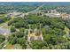 An aerial view of the community showcasing the tree lined streets and neighborhood at 126 Aurora Blvd, Matthews, NC 28105