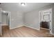 Bedroom featuring grey walls and luxury vinyl plank flooring at 126 Aurora Blvd, Matthews, NC 28105