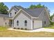 View of home showing attached two-car garage and paved driveway at 126 Aurora Blvd, Matthews, NC 28105