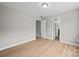 Spacious bedroom with light walls, and doorways to other rooms at 130 Aurora Blvd, Matthews, NC 28105
