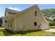 Two story home featuring vinyl siding, ample windows, and attached garage at 130 Aurora Blvd, Matthews, NC 28105
