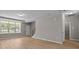 Unfurnished living area features wood floors and ample natural light at 130 Aurora Blvd, Matthews, NC 28105
