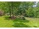 Spacious backyard with lush lawn, ideal for outdoor activities and relaxing at 1310 Weddington Hills Dr, Matthews, NC 28104