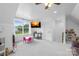 Bright playroom featuring large windows, a TV, and a small play kitchen area at 132 Witherspoon Ln, Statesville, NC 28677