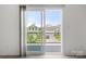Patio view of neighborhood homes from sliding glass doors at 15034 Scoter St, Charlotte, NC 28262