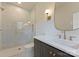 Modern bathroom with glass shower, stylish vanity, and contemporary finishes at 15037 June Washam Rd, Davidson, NC 28036