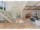 Spacious foyer with hardwood floors, a glass-lined staircase, and an open view to the dining room at 15037 June Washam Rd, Davidson, NC 28036