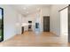 Open concept kitchen with stainless steel appliances and white cabinets at 15037 June Washam Rd, Davidson, NC 28036