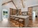 Spacious kitchen features marble countertops, stainless appliances, and a center island with seating at 15037 June Washam Rd, Davidson, NC 28036