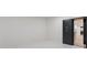 Secure safe room featuring a reinforced vault door and white tiled flooring at 15037 June Washam Rd, Davidson, NC 28036