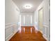 Gleaming hardwood floors and wainscoting welcomes you in the large foyer at 1520 Deer Forest Dr, Fort Mill, SC 29707