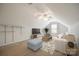 A spacious and well-lit living room with vaulted ceilings, cozy seating, and stylish decor at 1520 Deer Forest Dr, Fort Mill, SC 29707