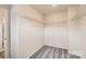 Walk-in closet with wire shelving for ample storage and neutral carpeting at 1547 Cottage Creek Dr, Bessemer City, NC 28016
