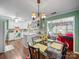 Bright, open kitchen with white cabinetry, eat-in dining area, and access to a cozy living room at 1634 - B Union Rd, Gastonia, NC 28054