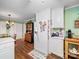 Spacious kitchen with white cabinets, stainless steel refrigerator, and open dining area at 1634 - B Union Rd, Gastonia, NC 28054