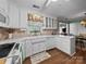 Bright kitchen with white cabinets, laminate countertops, and modern appliances, offering functionality at 1634 - B Union Rd, Gastonia, NC 28054