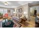 Cozy living room with hardwood floors, crown molding, and neutral decor, creating a warm and inviting atmosphere at 1634 - B Union Rd, Gastonia, NC 28054