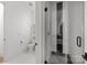 Elegant bathroom featuring herringbone shower tile and a seamless glass door entry at 2121 Laburnum Ave, Charlotte, NC 28205