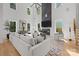Bright living room with high ceilings, statement fireplace, and large windows at 2121 Laburnum Ave, Charlotte, NC 28205