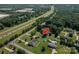 Aerial view of a property with a pool, blue shed, and proximity to the highway at 233 Reliance Rd, Kings Mountain, NC 28086