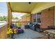 Relaxing back porch with comfortable seating, perfect for outdoor entertaining and enjoying the serene backyard at 233 Reliance Rd, Kings Mountain, NC 28086