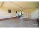 Spacious carport with access to the backyard and additional storage space, providing convenient covered parking at 233 Reliance Rd, Kings Mountain, NC 28086