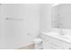 Clean bathroom featuring white fixtures, a spacious vanity, and a large mirror at 24578 Blue Heron Cir # 407, Lancaster, SC 29720