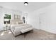 Bright bedroom with neutral tones, large windows, a comfortable bed, and modern decor at 24578 Blue Heron Cir # 407, Lancaster, SC 29720