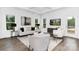 Comfortable living room with neutral colors, large windows, and stylish decor, perfect for relaxation at 24578 Blue Heron Cir # 407, Lancaster, SC 29720