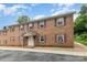A classic brick apartment building, showcasing its timeless design with inviting entrance and manicured grounds at 2607 Vail Ave, Charlotte, NC 28207