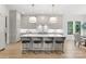 Bright kitchen with a large island, pendant lighting, and modern appliances, creating a stylish and functional space at 2921 Windsor Ave, Charlotte, NC 28209