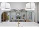 Cozy living room with a fireplace and stylish decor, viewed from the kitchen island at 2921 Windsor Ave, Charlotte, NC 28209