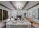 Bright living room with large windows, wooden beams, and stylish decor for relaxation at 2921 Windsor Ave, Charlotte, NC 28209
