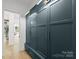 Organized mudroom with custom built-in storage, bench, and drawers for convenience at 2921 Windsor Ave, Charlotte, NC 28209