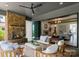 Covered outdoor patio with fireplace and comfortable seating, ideal for entertaining and relaxation at 2921 Windsor Ave, Charlotte, NC 28209