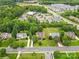 Aerial shot of a neighborhood featuring well-maintained homes, lush landscaping, and convenient access to nearby amenities at 3213 Strawberry Rd, Matthews, NC 28104