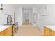 Spacious bathroom featuring dual sinks, a vanity and tile flooring at 3213 Strawberry Rd, Matthews, NC 28104
