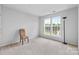 Bright bedroom with two windows and neutral carpet at 3213 Strawberry Rd, Matthews, NC 28104