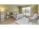 Stylish bedroom featuring an area rug, throw pillows, and natural light at 3213 Strawberry Rd, Matthews, NC 28104