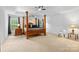 Main bedroom featuring carpet, a ceiling fan and a four-poster bed at 3213 Strawberry Rd, Matthews, NC 28104