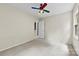 Bedroom with neutral carpet, white walls and a colorful ceiling fan at 328 Pamela St, Gastonia, NC 28054