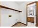Unfurnished laundry room next to a half bath features vinyl floors and utility connections at 328 Pamela St, Gastonia, NC 28054