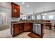 Well-appointed kitchen with stainless steel appliances, granite countertops, and an open layout at 3351 Streamside Dr, Davidson, NC 28036