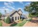 Brick home exterior with a patio, gazebo, and manicured lawn providing an ideal outdoor space at 3441 Club Ridge Ct, Gastonia, NC 28056