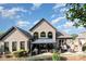 Beautiful backyard with a patio, gazebo, and lush landscaping, perfect for outdoor entertaining at 3441 Club Ridge Ct, Gastonia, NC 28056
