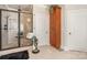 Modern bathroom features a glass enclosed shower with stylish tile work and decorative accents at 3441 Club Ridge Ct, Gastonia, NC 28056